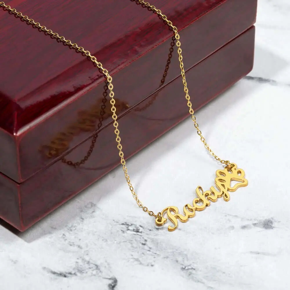 A Gift That Speaks Volumes: Personalized Paw Print Name Necklace for t