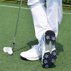 Golfer wearing Sampson Men's Golf Shoes with soft spikes, ready to take a swing on the green.