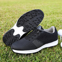 Waterproof men's golf shoes on grass, featuring advanced grip and style for comfort and performance in all weather conditions.