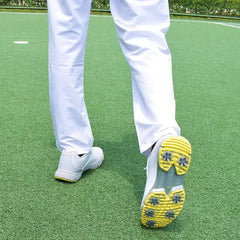 Sampson Men's Golf Shoes showing yellow spiked soles for ultimate grip on the course.