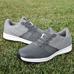 Waterproof men’s golf shoes training sneakers on grass, designed for comfort and performance in all weather conditions.