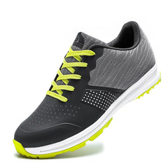 Waterproof men’s golf shoes with gray and green design, featuring comfortable and durable training sneakers for all-weather performance.